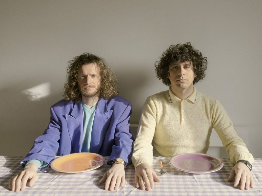 I due cantanti Cecco e Cipo a tavola