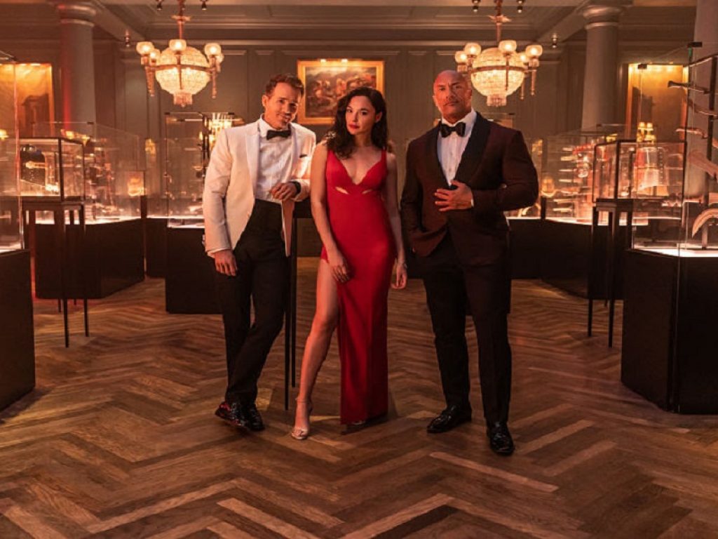 Netflix svela la data di uscita di Red Notice, l’atteso film con Dwayne Johnson, Gal Gadot e Ryan Reynolds che mescola thriller, azione e commedia